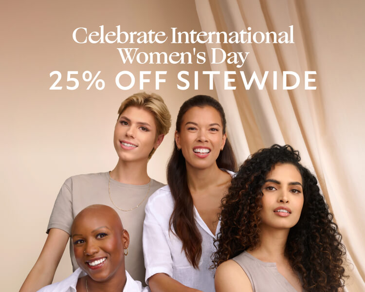 A diverse group of four smiling individuals posing together, promoting an International Women’s Day sale with 25% off sitewide. The text states " Empowering Beauty , Celebrating Women , Celebrate International Women's Day with 25% Off Sitewide"